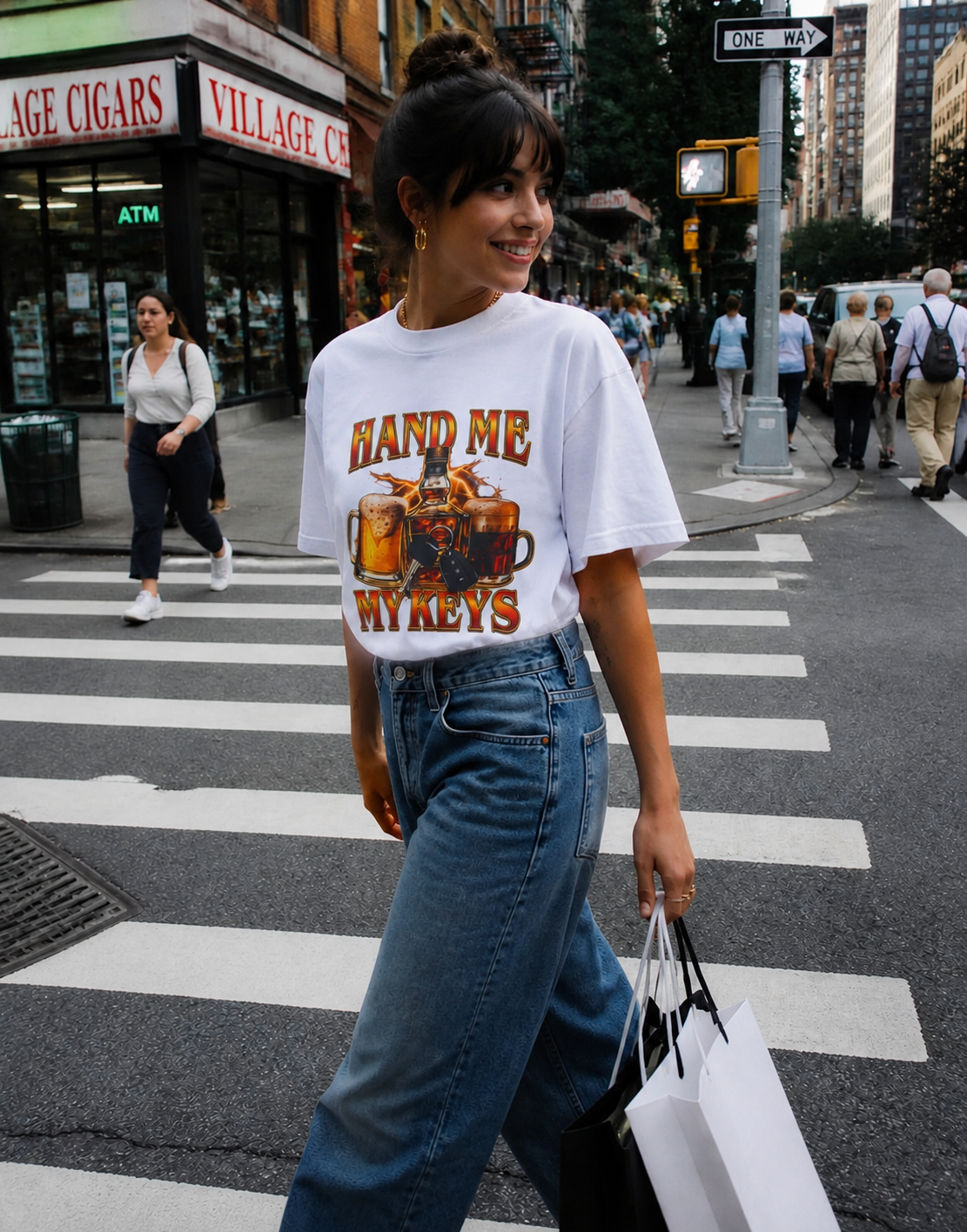 Woman crossing a New York City street in a Bridgepoint Cloth graphic tee
